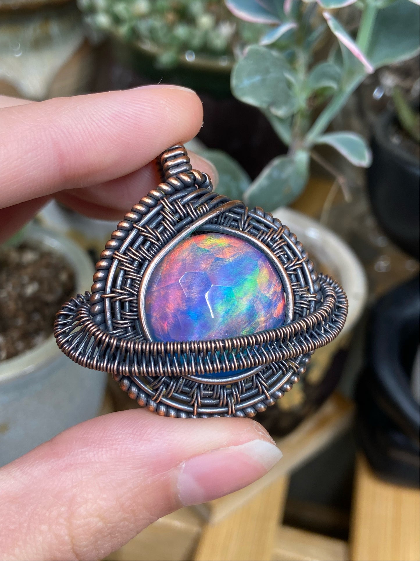 Aurora Opal Saturn amulet