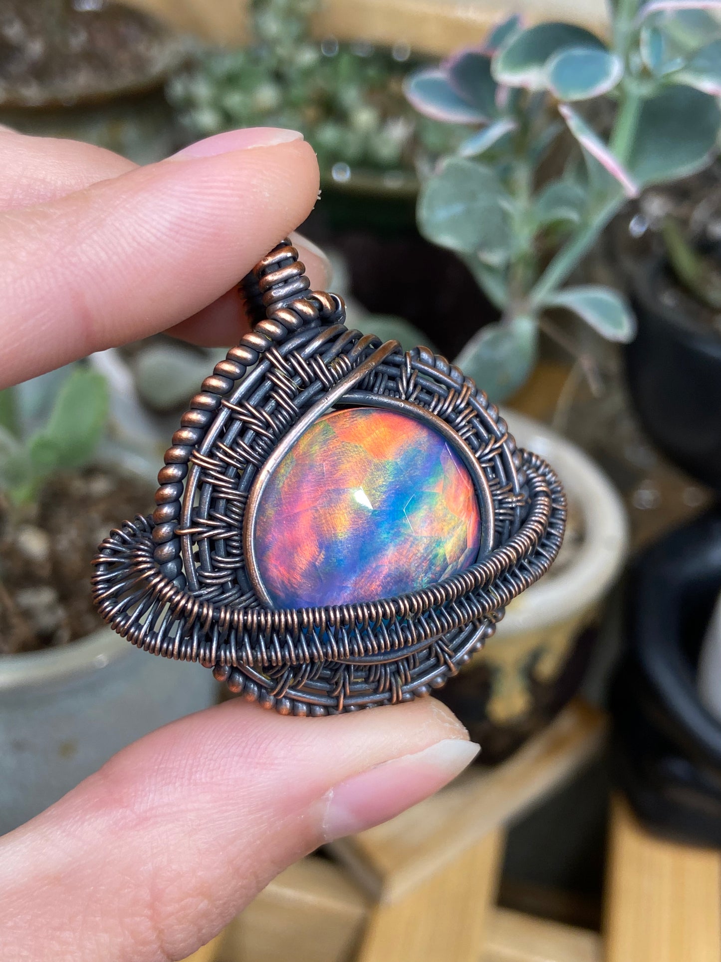 Aurora Opal Saturn amulet