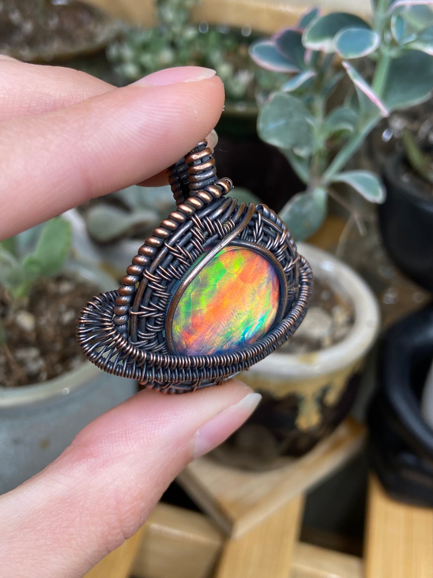 Aurora Opal Saturn amulet