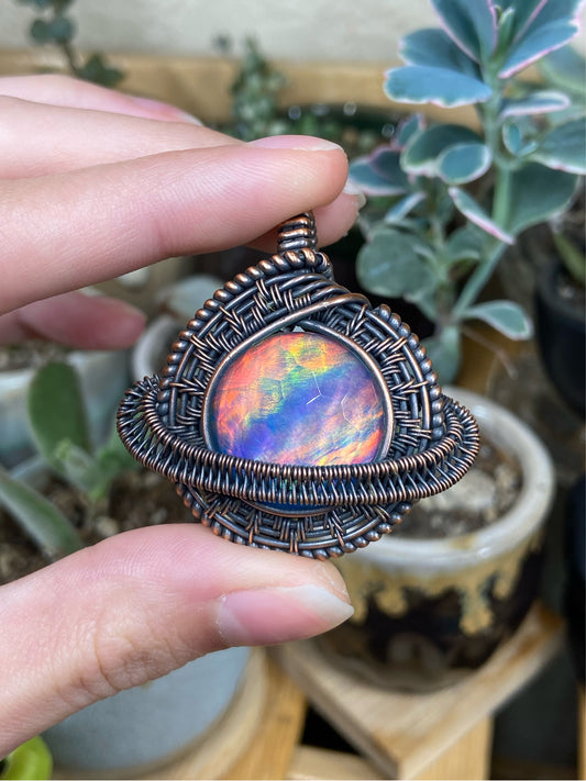 Aurora Opal Saturn amulet