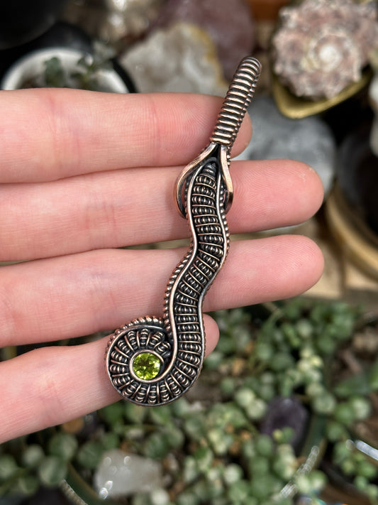 Peridot snake amulet