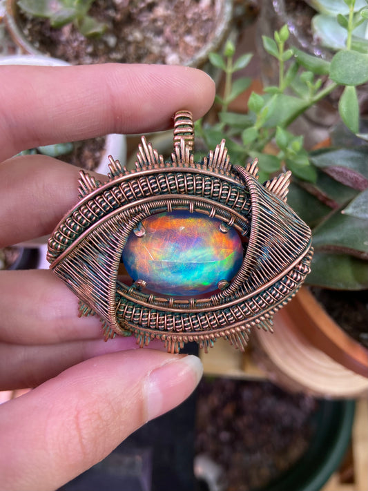 The ancient Aurora Opal eye amulet