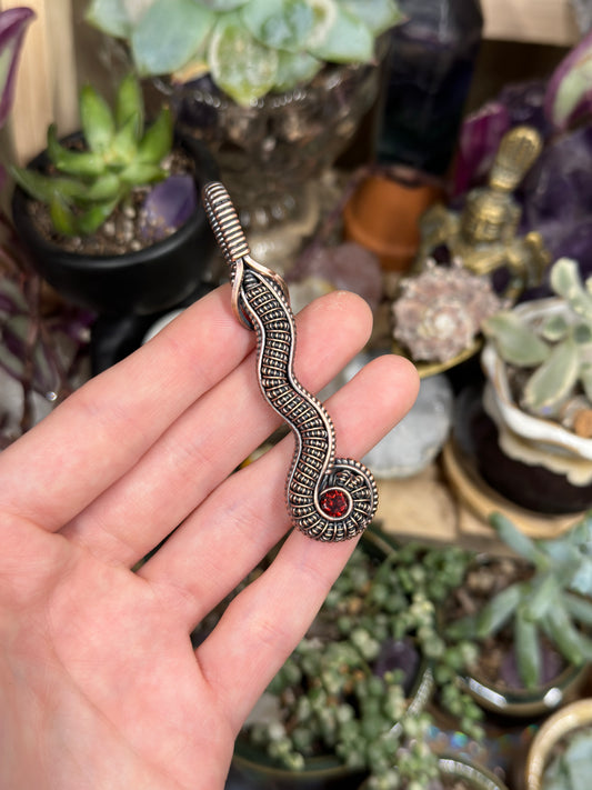 Garnet snake amulet