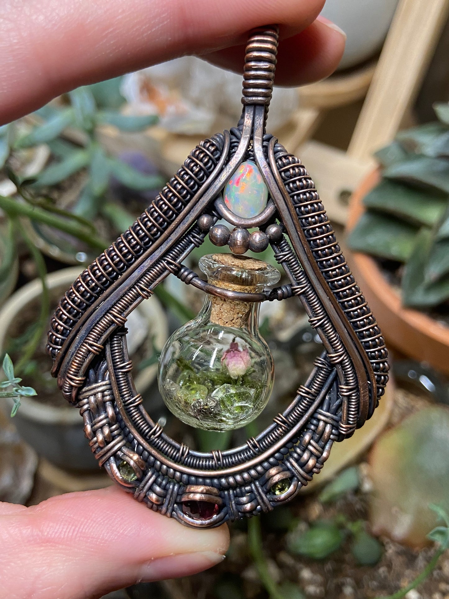 Garden rose terrarium amulet