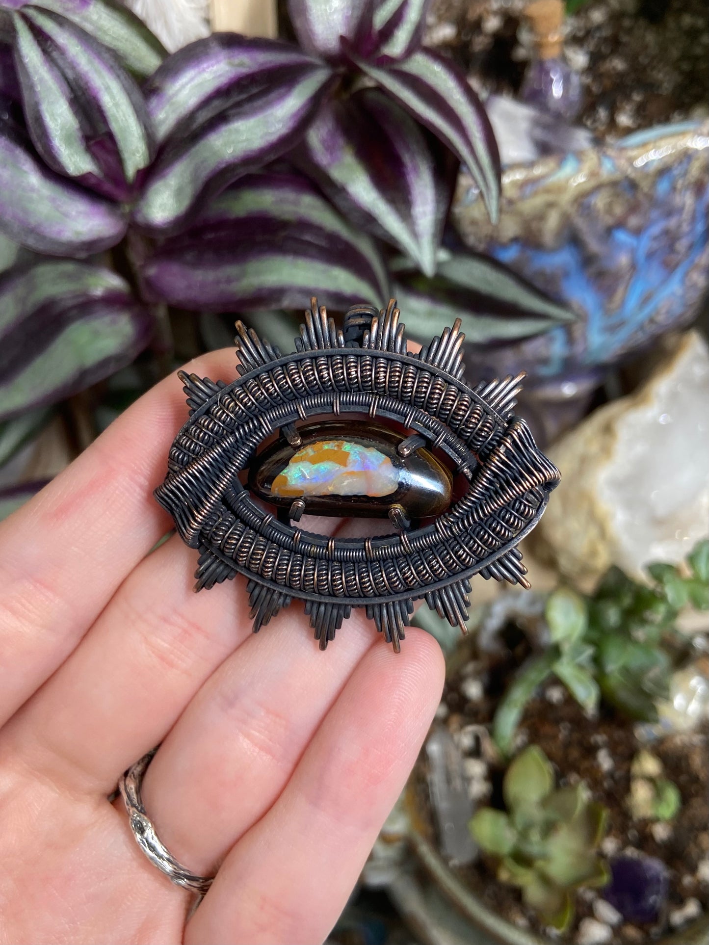 Australian Boulder Opal eye amulet in copper