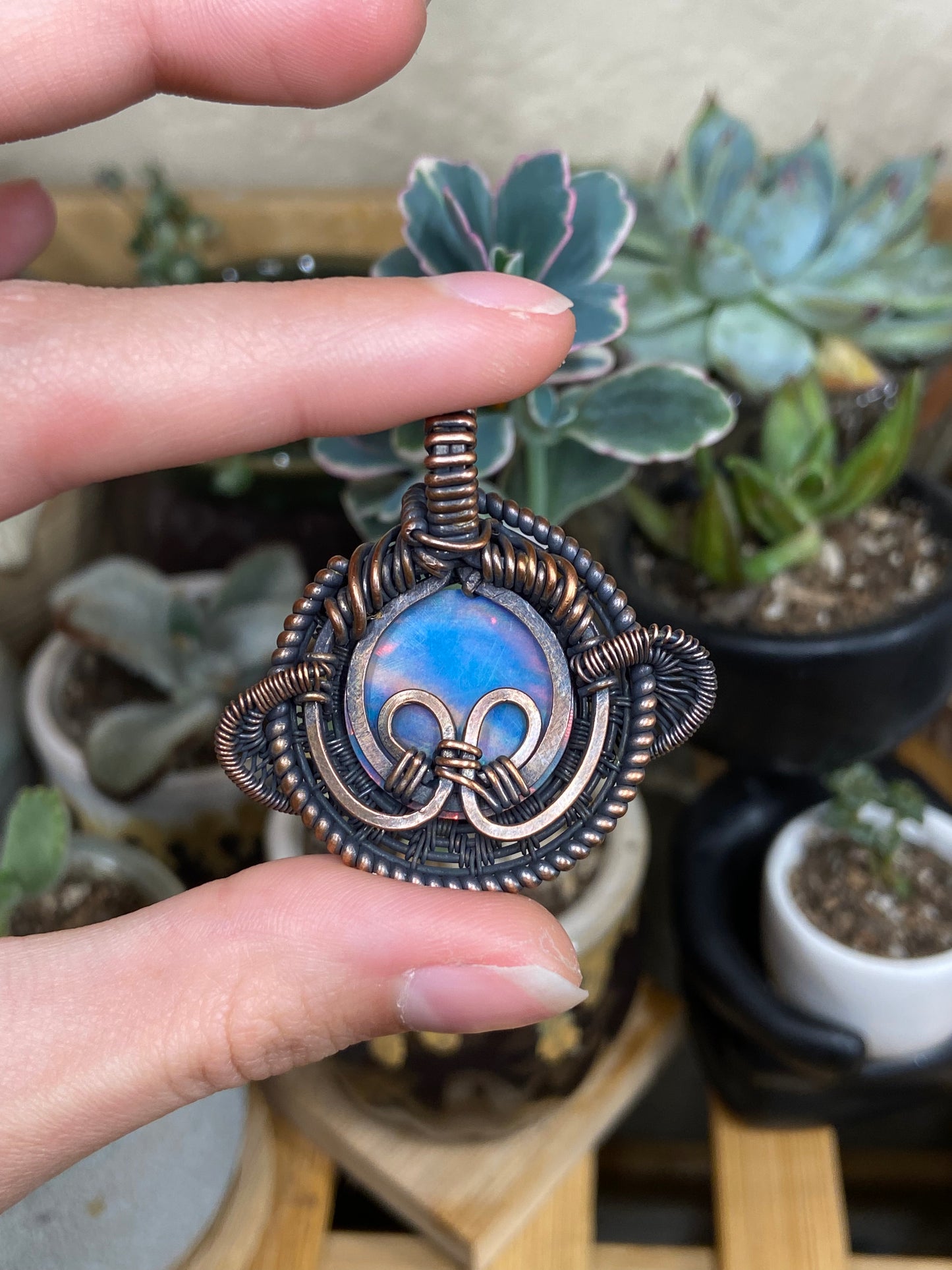 Aurora Opal Saturn amulet